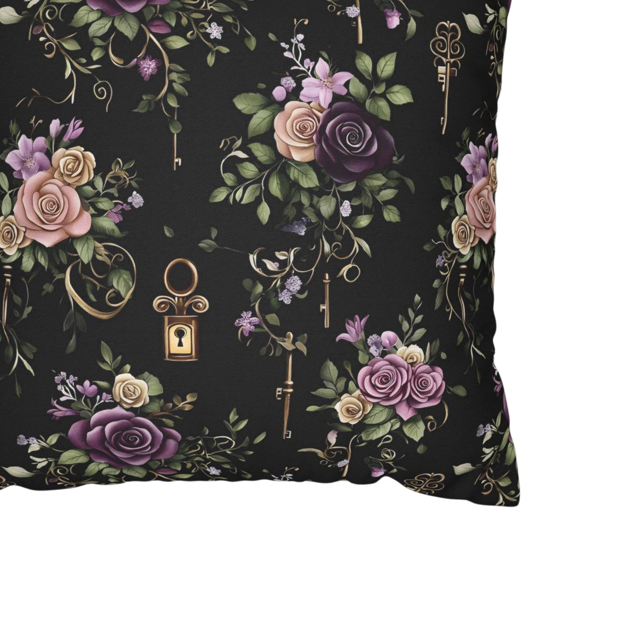 Corner close-up of a polyester pillow cover with a floral and key pattern on a black background