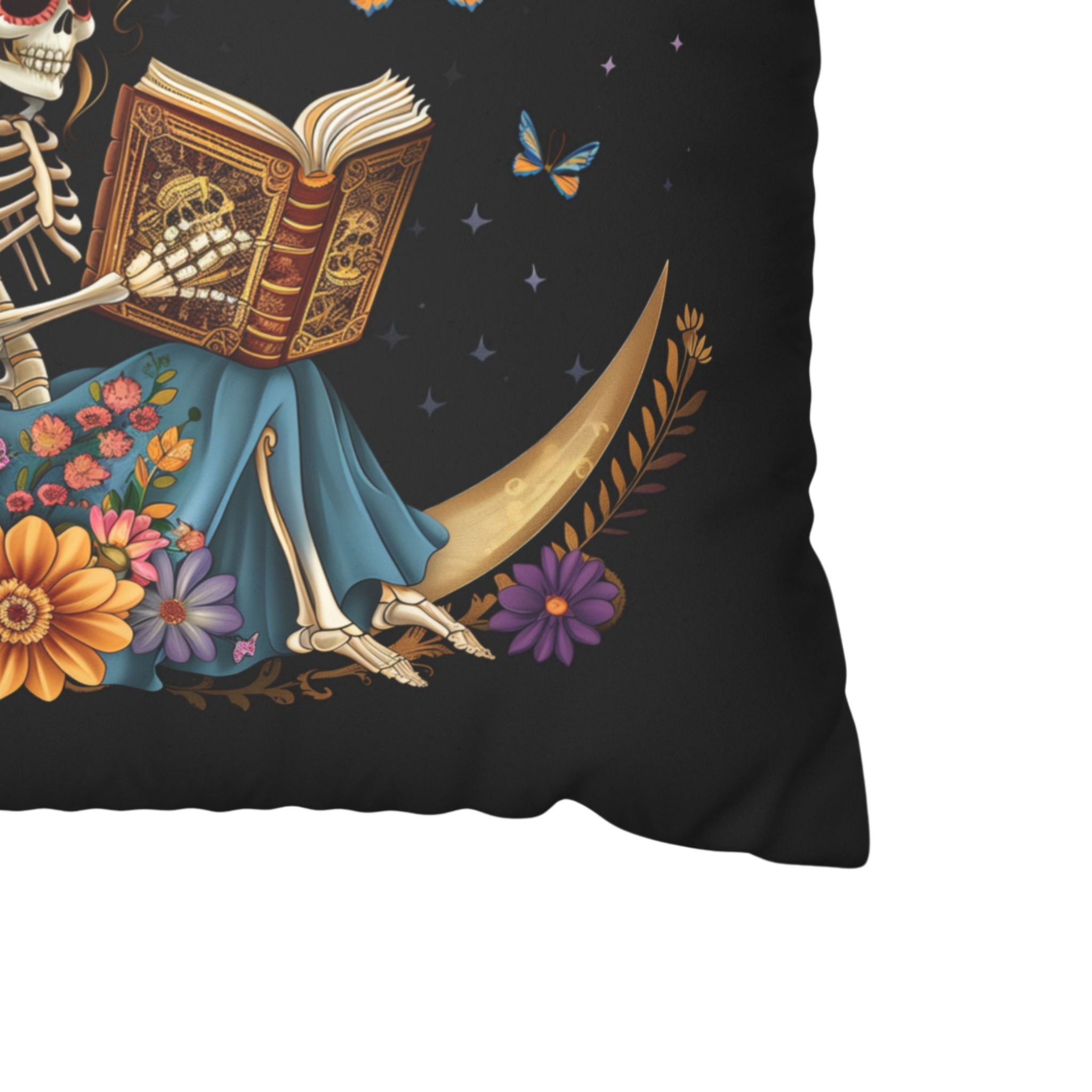 Close up of the corner of a pillow cover showing part of the celestial skeleton design.