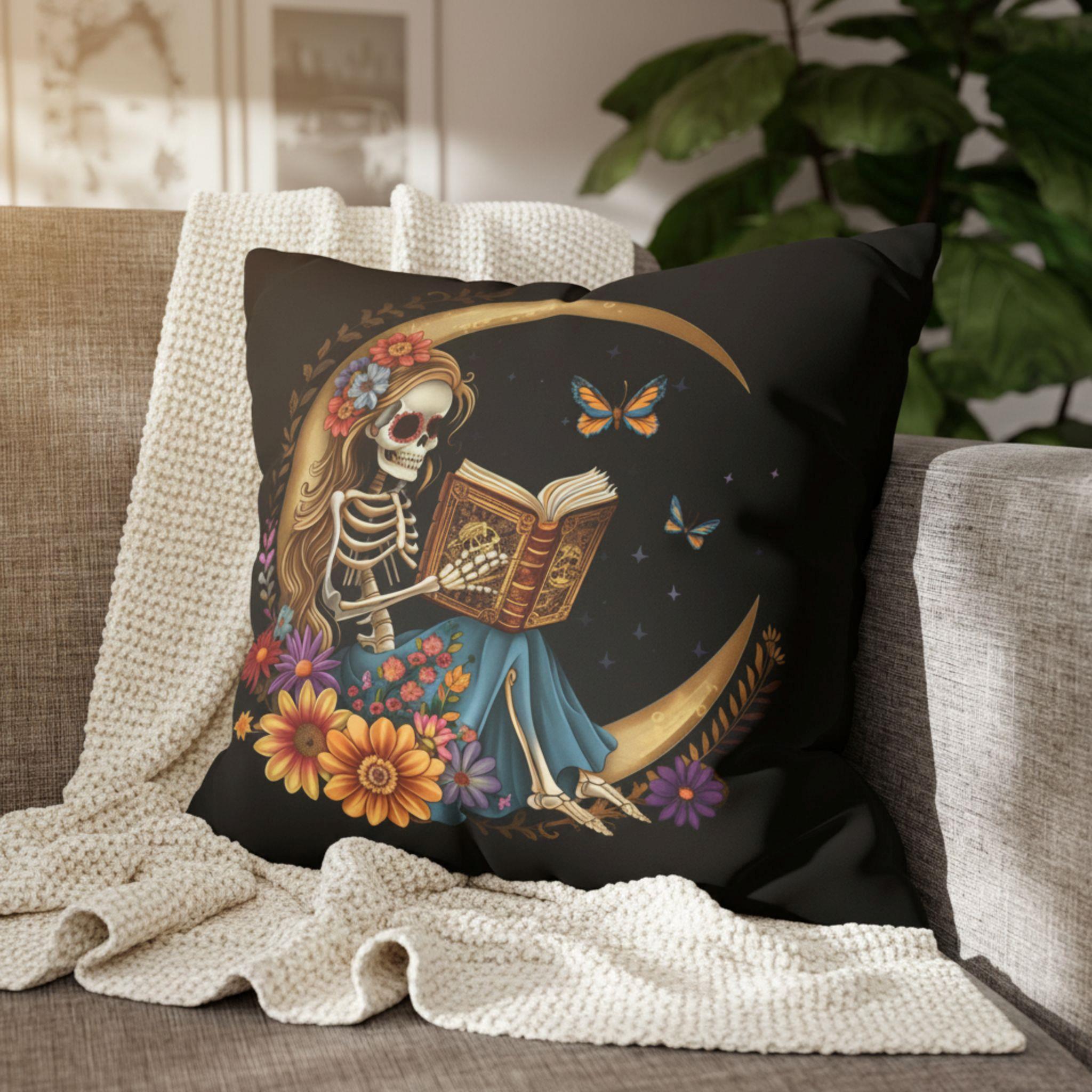 Skeleton moon pillow cover styled on bed with gothic botanical decor