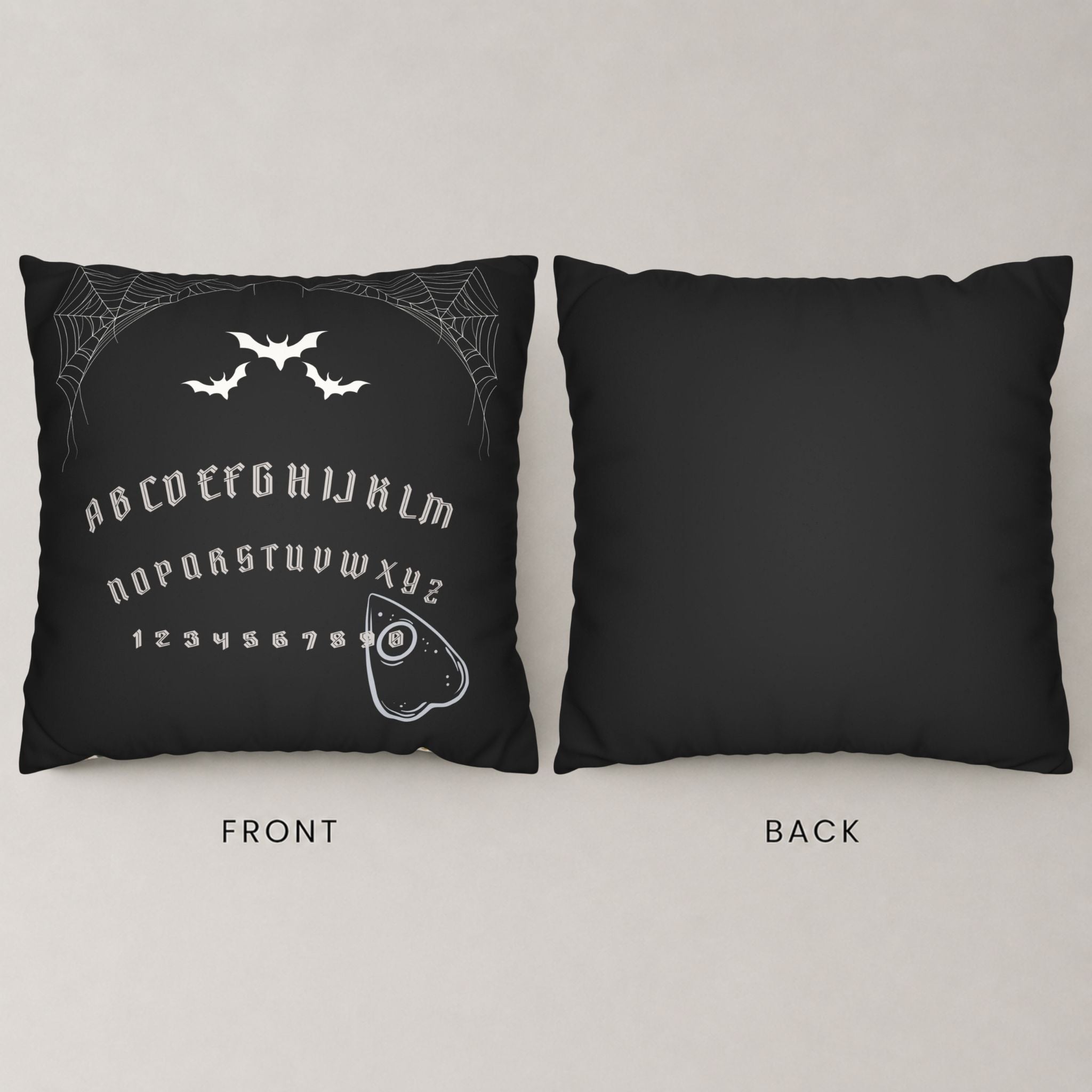 Gothic Halloween pillow cover showing a ouija board on the front and black back