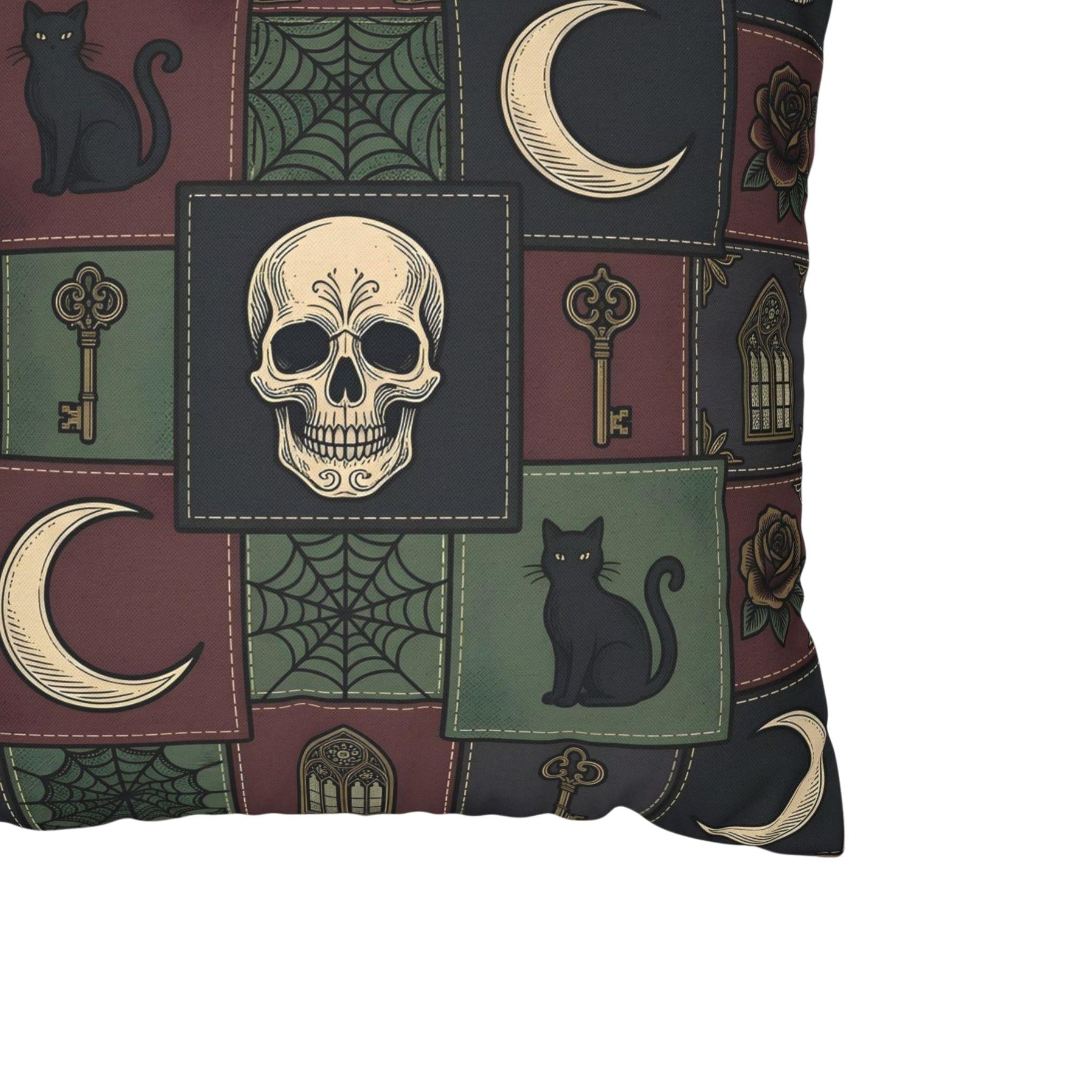 Close up of gothic pattern on a pillow cover showing a skull, skeleton keys, crescent moon, spider webs and black cats.