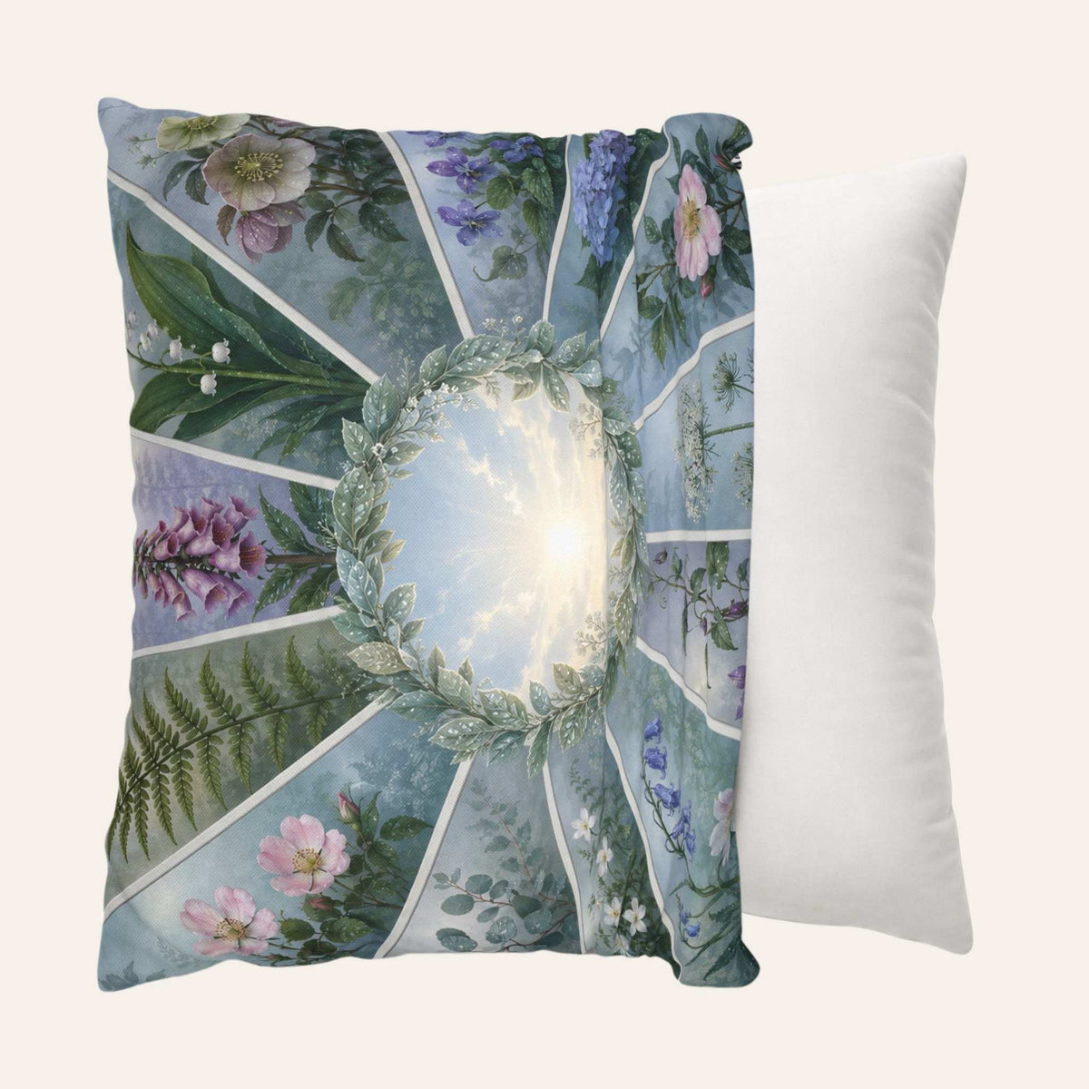 A square decorative pillow cover with a botanical and sky-themed collage print, shown being put onto a throw pillow.
