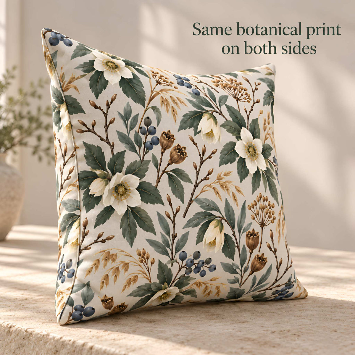 Winter floral botanical pillow shown from the back with matching print on both sides