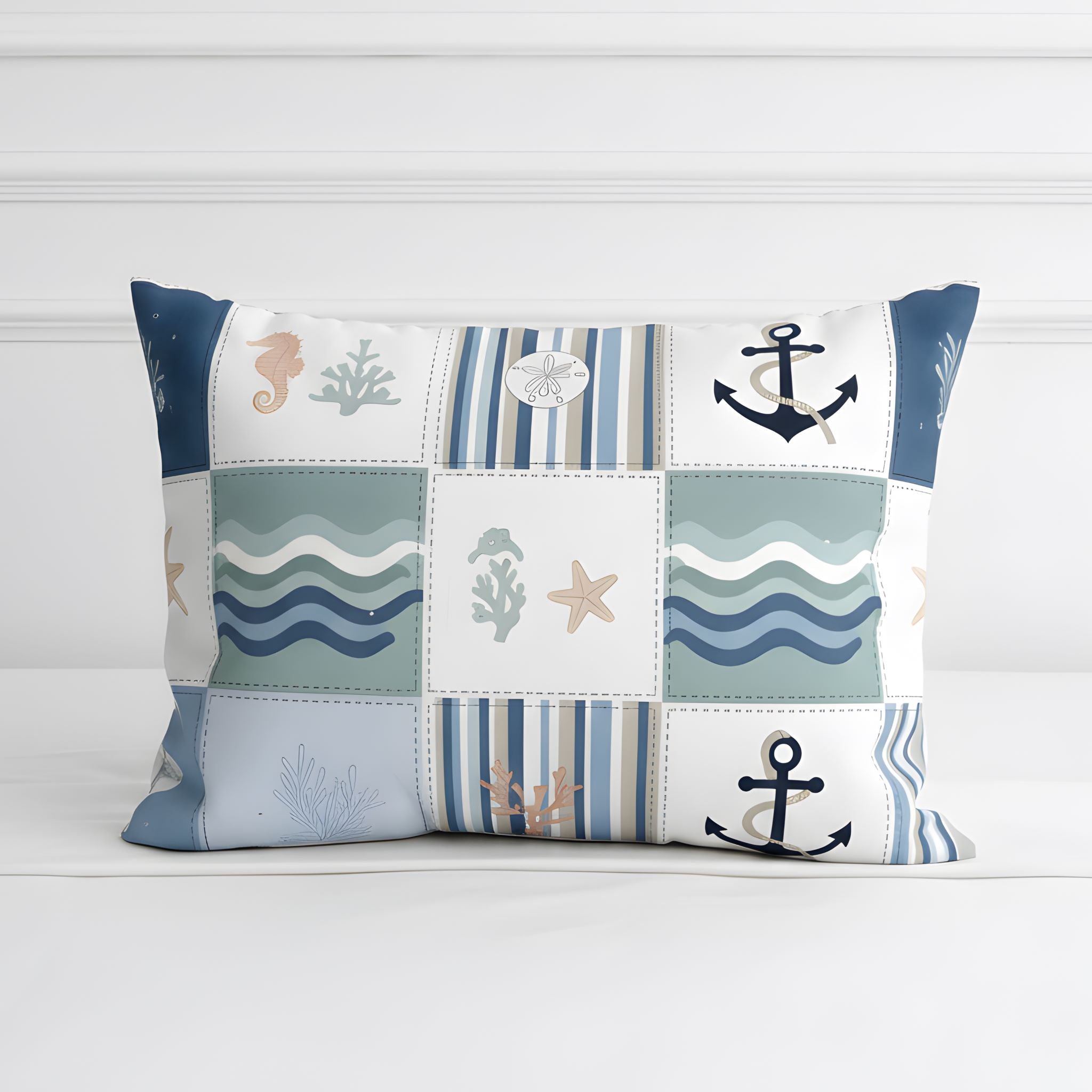 Coastal pillow sham with blue and white nautical pattern.