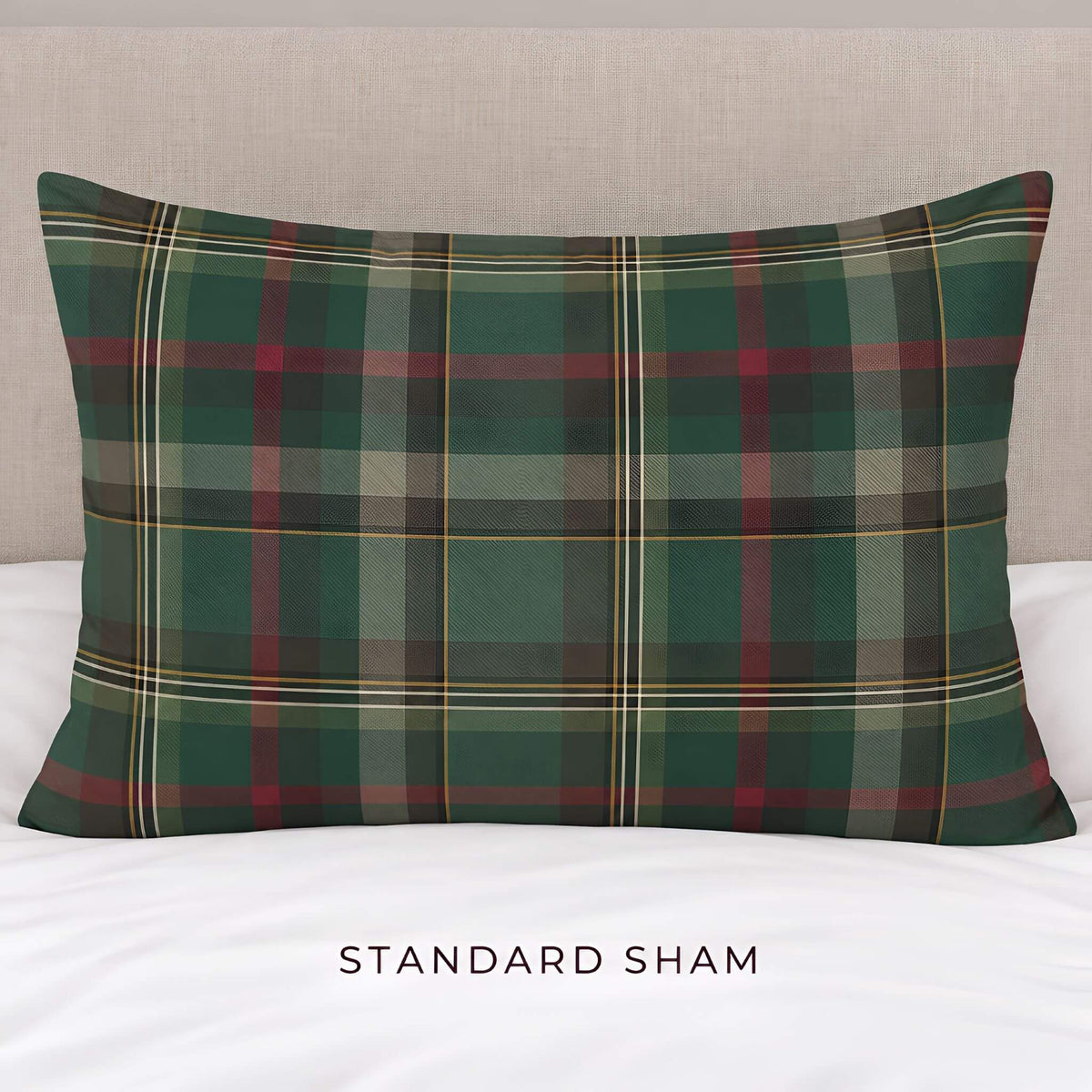 Standard Cedar Ember cotton pillow sham with green tartan plaid on white bedding.