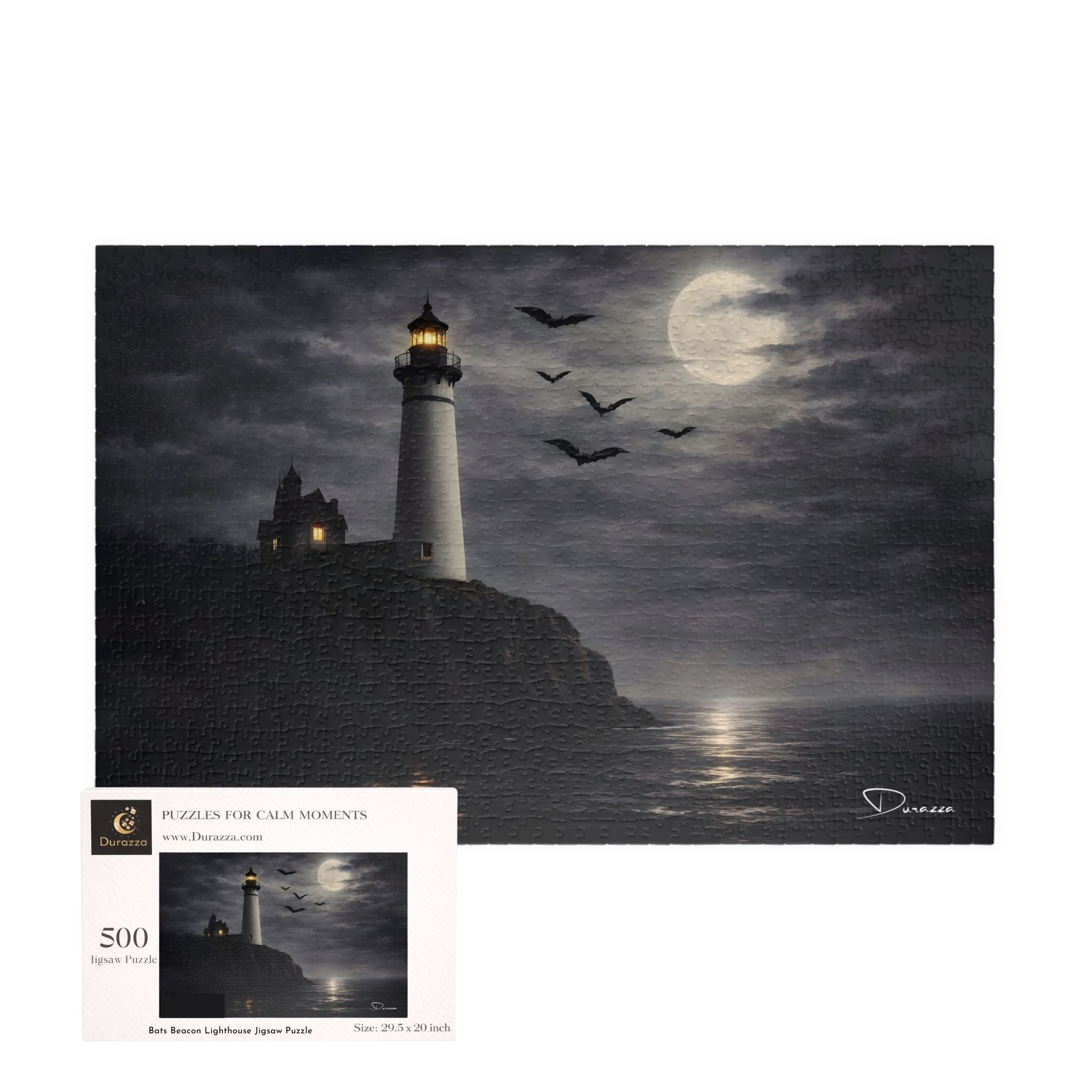 Lighthouse scene with moonlit sky and flying bats, and a 500 piece Durazza jigsaw puzzle box.