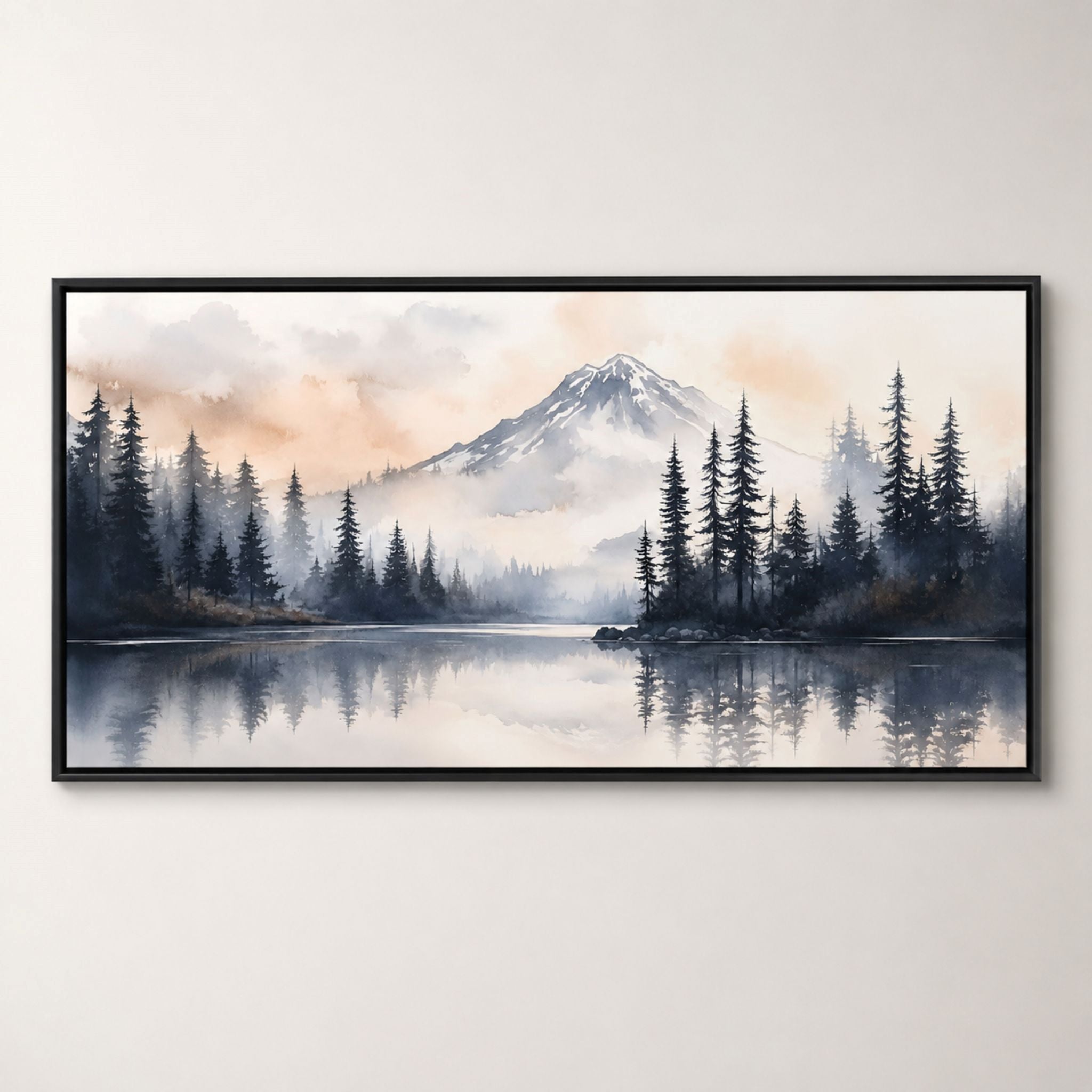Framed canvas artwork of a mountain landscape with trees and water on a white wall.
