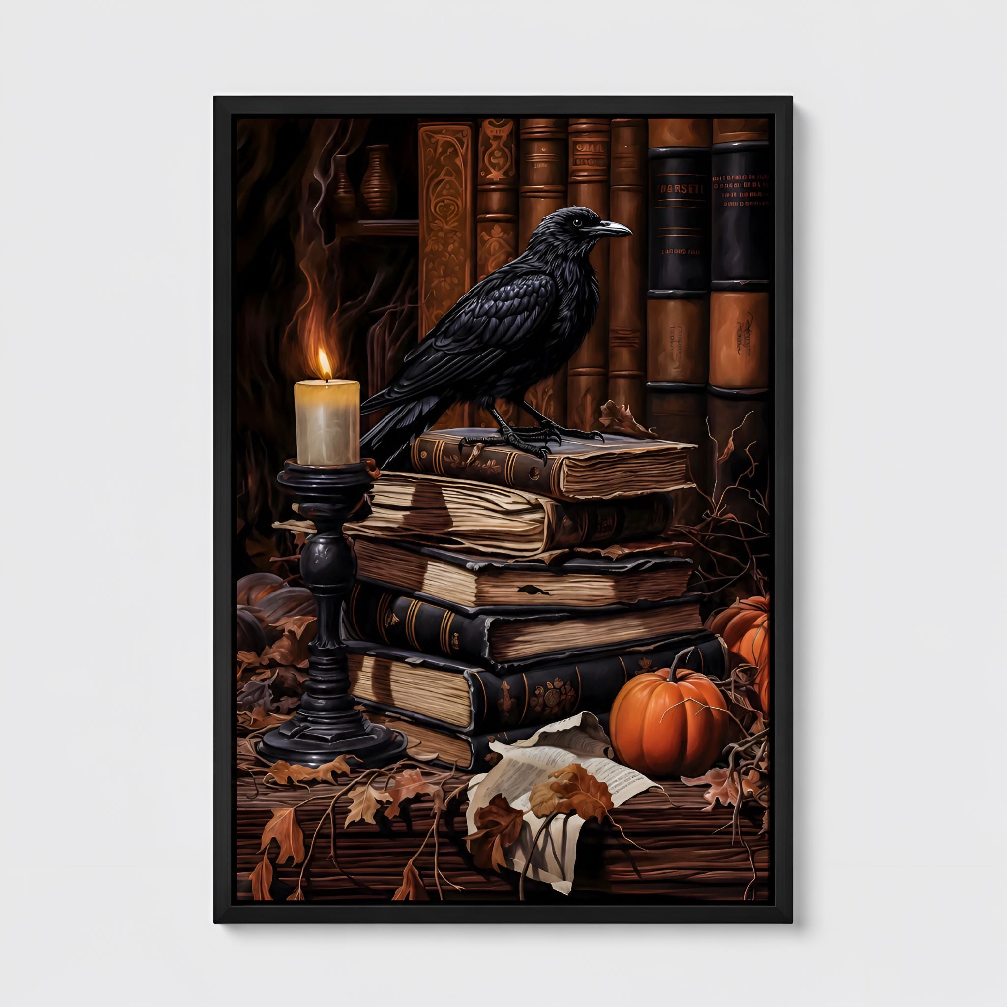 Black framed artwork of a black crow on books with a candle and pumpkin, evoking a dark academia theme.