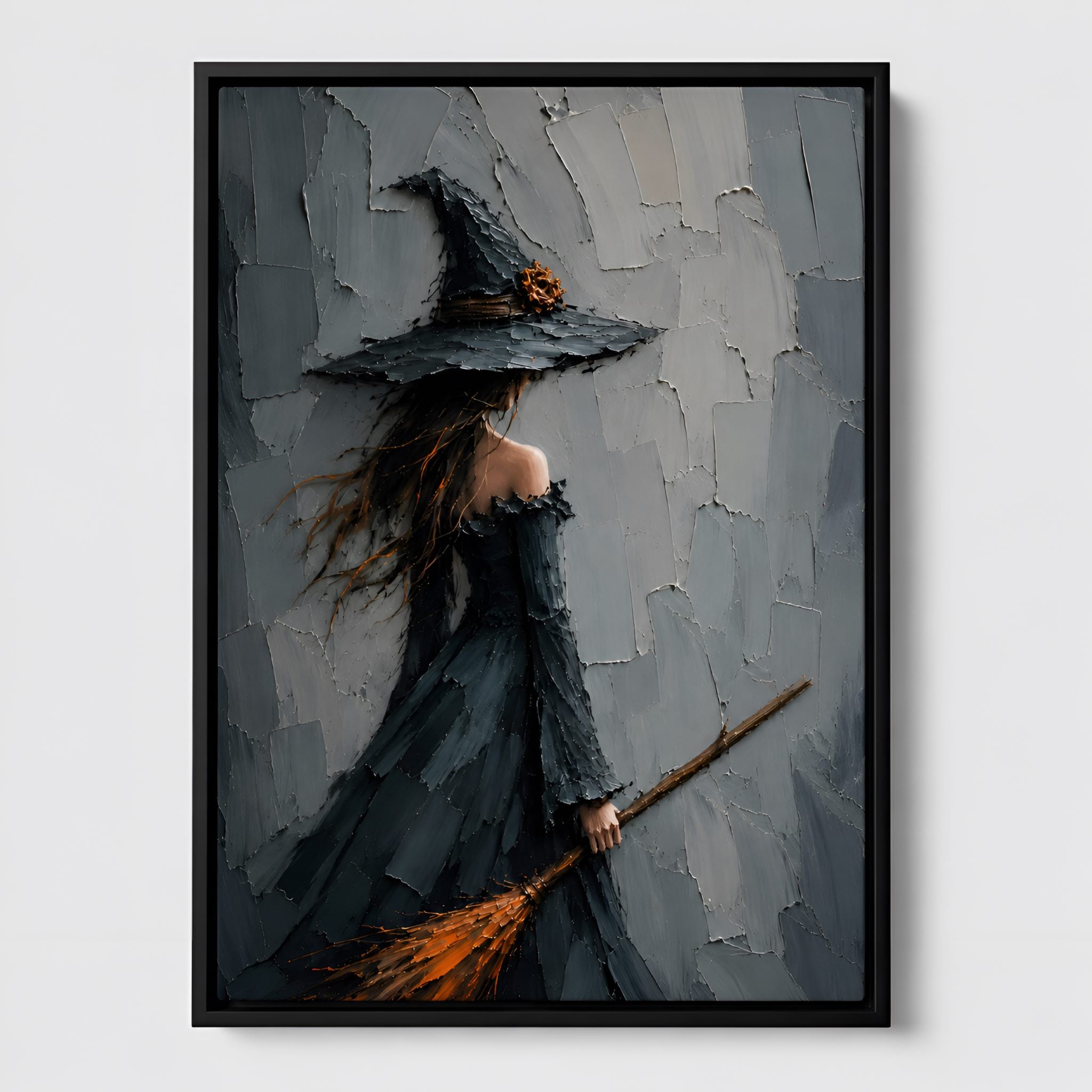 Whimsigoth witch canvas wall art in a black frame featuring a witchy figure with ember broom and gray palette-knife texture.