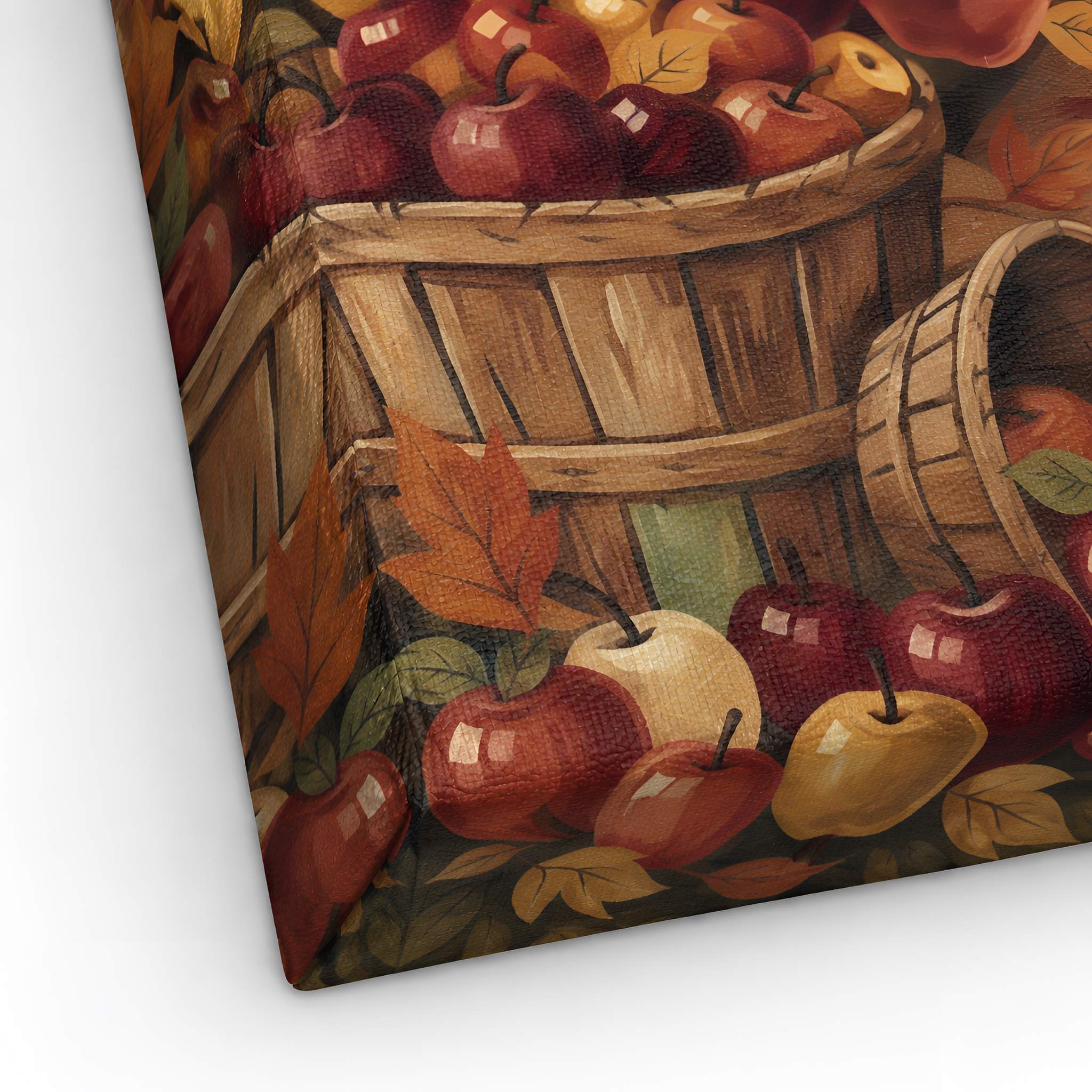 Decorative canvas art print with apples, Autumn leaves, and a wooden basket on a white background